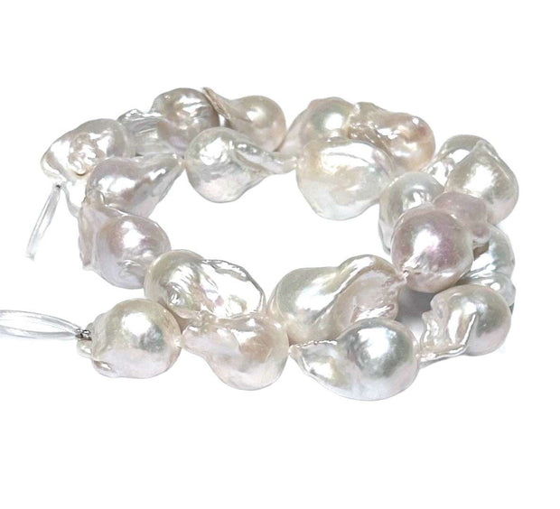 Baroque 14 - 24mm 20 pcs White Pink Tone Cultured Keshi Pearl 16" StraGorgeous Special Baroque 14 - 24mm 20 pcs. Natural White Hints Pink Tones Cultured Keshi Kasum Pearl 16" Strand - For Making 18" Necklace / Best Gift For Her

PEARL NecklacesFine JewelryThe Fine Pearls JewelryBaroque 14 - 24mm 20 pcs White Pink Tone Cultured Keshi Pearl 16" Strand