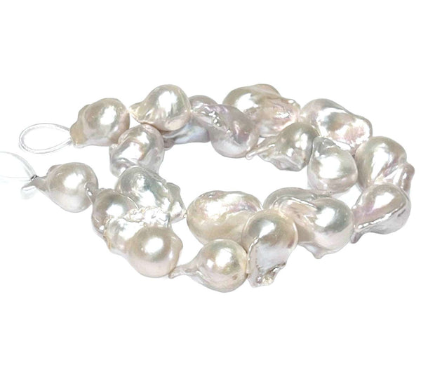 Baroque 14 - 24mm 20 pcs White Pink Tone Cultured Keshi Pearl 16" StraGorgeous Special Baroque 14 - 24mm 20 pcs. Natural White Hints Pink Tones Cultured Keshi Kasum Pearl 16" Strand - For Making 18" Necklace / Best Gift For Her

PEARL NecklacesFine JewelryThe Fine Pearls JewelryBaroque 14 - 24mm 20 pcs White Pink Tone Cultured Keshi Pearl 16" Strand