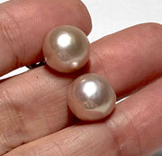 Classic 5A Luster 10.5mm Purple Pink Round Edison Pearl Stud Earrings100% Genuine and Authentic! Beautiful 5A luster. Best Gift For her! Best Gift for Her Classic Mirror Luster 10.5mm Peach Pink Round Edison Cultured Pearl Stud EarrinEarringsFine JewelryThe Fine Pearls Jewelry5mm Purple Pink Round Edison Pearl Stud Earrings