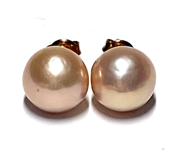 Classic 5A Luster 10.5mm Purple Pink Round Edison Pearl Stud Earrings100% Genuine and Authentic! Beautiful 5A luster. Best Gift For her! Best Gift for Her Classic Mirror Luster 10.5mm Peach Pink Round Edison Cultured Pearl Stud EarrinEarringsFine JewelryThe Fine Pearls Jewelry5mm Purple Pink Round Edison Pearl Stud Earrings