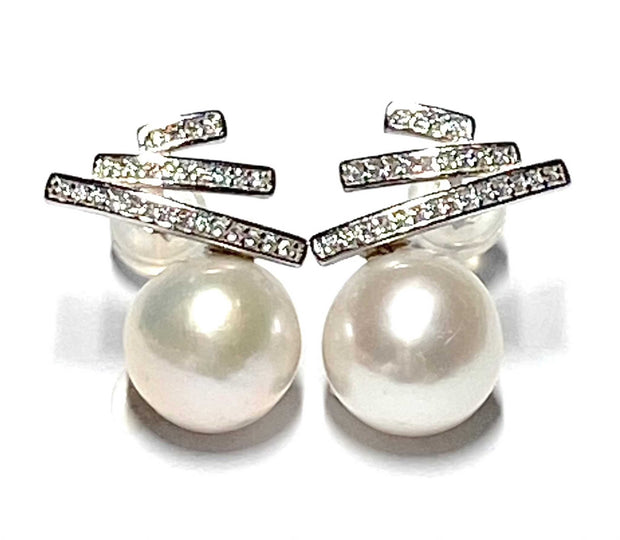 Charming White 9.2mm Round Edison Cultured Pearl Dangle Stud Earrings100% Authentic and Genuine! Best Gift For her! Exquisite 9.2mm Natural White Round Edison Cultured Pearl Dangle Handmade Earrings
PEARL INFORMATION

Pearl Type: PremEarringsFine JewelryThe Fine Pearls Jewelry2mm Round Edison Cultured Pearl Dangle Stud Earrings