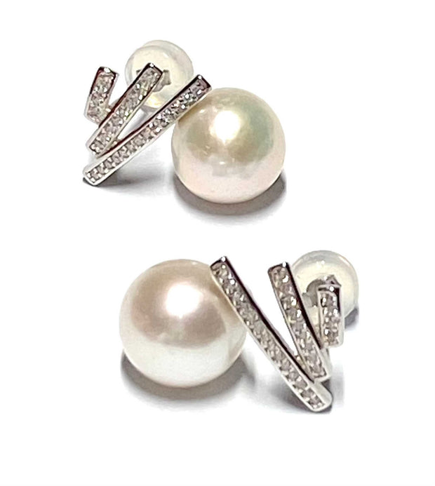 Charming White 9.2mm Round Edison Cultured Pearl Dangle Stud Earrings100% Authentic and Genuine! Best Gift For her! Exquisite 9.2mm Natural White Round Edison Cultured Pearl Dangle Handmade Earrings
PEARL INFORMATION

Pearl Type: PremEarringsFine JewelryThe Fine Pearls Jewelry2mm Round Edison Cultured Pearl Dangle Stud Earrings