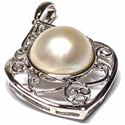 Elegant Solid 14K White Gold Natural White Round South Sea Mabe Pearl Embrace timeless luxury with our Elegant Solid 14K White Gold Natural White Round South Sea Mabe Pearl Pendant. This exquisite pendant features a stunning South Sea Charms & PendantsFine JewelryThe Fine Pearls JewelryElegant Solid 14K White Gold Natural White Round South Sea Mabe Pearl Pendant – Timeless Luxury