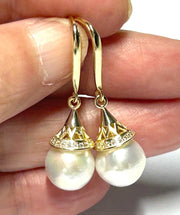 Exquisite 10 - 10.5mm Edison Natural White Round Pearl Dangle EarringsAdd a touch of elegance to your collection with our Exquisite 10 - 10.5mm Edison Natural White Round Pearl Dangle Earrings. These stunning earrings feature perfectlyEarringsFine JewelryThe Fine Pearls Jewelry5mm Edison Natural White Round Pearl Dangle Earrings - Elegant