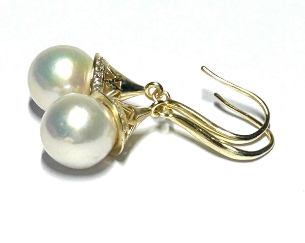 Exquisite 10 - 10.5mm Edison Natural White Round Pearl Dangle EarringsAdd a touch of elegance to your collection with our Exquisite 10 - 10.5mm Edison Natural White Round Pearl Dangle Earrings. These stunning earrings feature perfectlyEarringsFine JewelryThe Fine Pearls Jewelry5mm Edison Natural White Round Pearl Dangle Earrings - Elegant