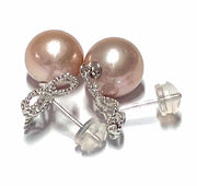 5A Quality 10 - 10.5mm Purple Pink Round Edison Cultured Pearl EarringExcellent Natural Purple Pink Round 10 - 10.5mm Edison Cultured Super High Luster Pearl Dangle Earrings / Best Gift For HerPEARL INFORMATIONPearl Type: Genuine EdisoEarringsFine JewelryThe Fine Pearls Jewelry5mm Purple Pink Round Edison Cultured Pearl Earrings