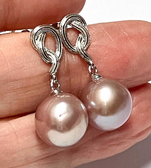 Stunning 10 - 10.5mm Lavender Pink Round Edison Cultured Pearl EarringStunning Natural Lavender Pink Round 10 - 10.5mm Edison Cultured Super High Luster Pearl Dangle Earrings / Best Gift For HerPEARL INFORMATIONPearl Type: Genuine EdisEarringsFine JewelryThe Fine Pearls Jewelry5mm Lavender Pink Round Edison Cultured Pearl Earrings