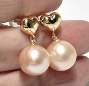 Stunning 10.5 - 11mm Peach Gold Round Edison Pearl Dangle EarringsExquisite 10.5 - 11mm Natural Peach Gold Round Edison Cultured Pearl Handmade Stylish Dangle Earrings / Best Gift For Her


PEARL INFORMATION

Pearl Type: Genuine EdOther Pearl EarringsFine JewelryThe Fine Pearls Jewelry5 - 11mm Peach Gold Round Edison Pearl Dangle Earrings