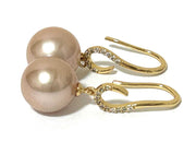 Trendy Round 10.5-11mm Purple Rose Pink Edison Cultured Pearl EarringsElevate your style with our Trendy Round 10.5-11mm Purple Rose Pink Edison Cultured Pearl Earrings. These earrings feature beautiful Edison pearls in a stunning blenEarringsFine JewelryThe Fine Pearls JewelryTrendy Round 10