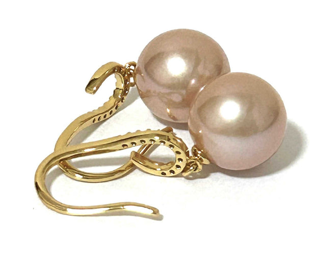 Trendy Round 10.5-11mm Purple Rose Pink Edison Cultured Pearl EarringsElevate your style with our Trendy Round 10.5-11mm Purple Rose Pink Edison Cultured Pearl Earrings. These earrings feature beautiful Edison pearls in a stunning blenEarringsFine JewelryThe Fine Pearls JewelryTrendy Round 10