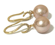 Trendy Round 10.5-11mm Purple Rose Pink Edison Cultured Pearl EarringsElevate your style with our Trendy Round 10.5-11mm Purple Rose Pink Edison Cultured Pearl Earrings. These earrings feature beautiful Edison pearls in a stunning blenEarringsFine JewelryThe Fine Pearls JewelryTrendy Round 10