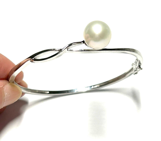 Premier 10.5 - 11mm White Edison Cultured Round Pearl 7 - 7.5" BangleFabulous Natural White Round 10.5 - 11mm Edison Cultured Excellent High Luster Pearl 7 - 7.5" Handmade Bangle / Best Gift For Her / Christmas GiftPEARL INFORMATIONPeBraceletsFine JewelryThe Fine Pearls Jewelry5 - 11mm White Edison Cultured Round Pearl 7 - 7