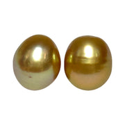 A Pair 11 x 13mm 22.8 Carats Deep Gold South Sea Oval Loose Pearls