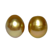 A Pair 11 x 13mm 22.8 Carats Deep Gold South Sea Oval Loose Pearls