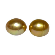 A Pair 11 x 13mm 22.8 Carats Deep Gold South Sea Oval Loose Pearls