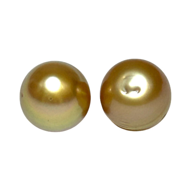 A Pair 11 x 13mm 22.8 Carats Deep Gold South Sea Oval Loose Pearls