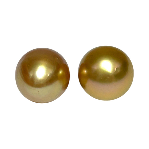 A Pair 11 x 13mm 22.8 Carats Deep Gold South Sea Oval Loose Pearls