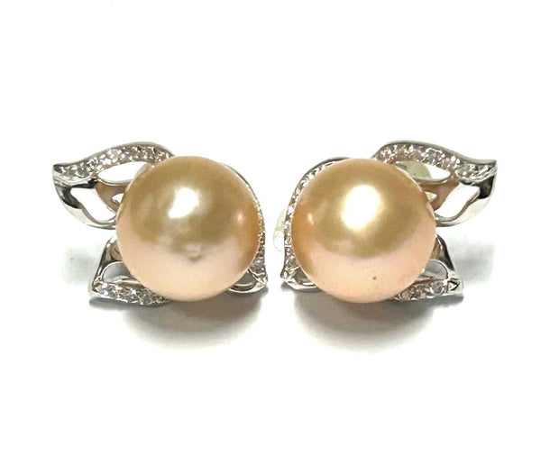 Gorgeous 9.5 - 10mm Peach Pink Edison Round Cultured Pearl Stud EarrinGorgeous 9.5 - 10mm Natural Peach Pink Edison Round Cultured Pearl Handmade Classic Stud Earrings / Wedding Bridal Best GiftPEARL INFORMATIONType: Genuine Edison CulEarringsFine JewelryThe Fine Pearls Jewelry5 - 10mm Peach Pink Edison Round Cultured Pearl Stud Earrings