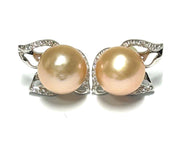 Gorgeous 9.5 - 10mm Peach Pink Edison Round Cultured Pearl Stud EarrinGorgeous 9.5 - 10mm Natural Peach Pink Edison Round Cultured Pearl Handmade Classic Stud Earrings / Wedding Bridal Best GiftPEARL INFORMATIONType: Genuine Edison CulEarringsFine JewelryThe Fine Pearls Jewelry5 - 10mm Peach Pink Edison Round Cultured Pearl Stud Earrings