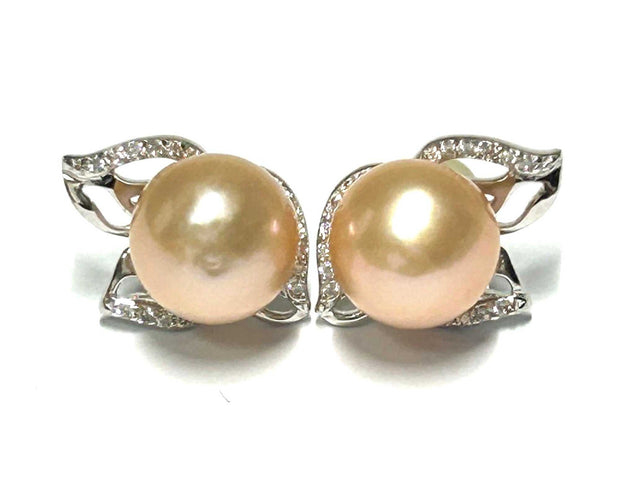 Gorgeous 9.5 - 10mm Peach Pink Edison Round Cultured Pearl Stud EarrinGorgeous 9.5 - 10mm Natural Peach Pink Edison Round Cultured Pearl Handmade Classic Stud Earrings / Wedding Bridal Best GiftPEARL INFORMATIONType: Genuine Edison CulEarringsFine JewelryThe Fine Pearls Jewelry5 - 10mm Peach Pink Edison Round Cultured Pearl Stud Earrings