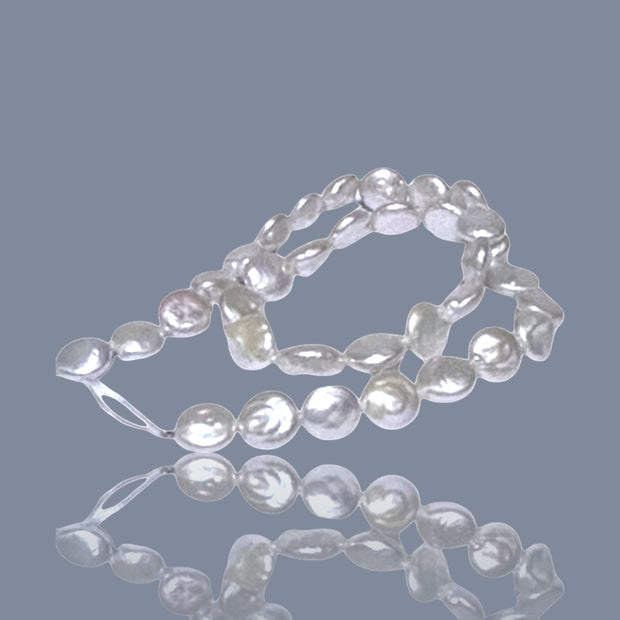 Gorgeous 10.5 - 11mm Jumbo Oval Round White Cultured FW Pearl 16" Strand