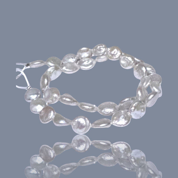 Gorgeous 10.5 - 11mm Jumbo Oval Round White Cultured FW Pearl 16" Strand