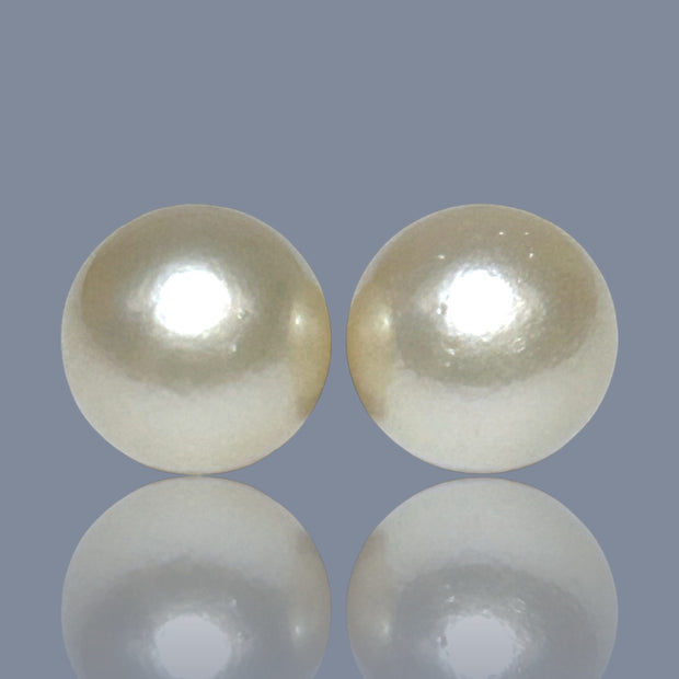 A Pair 42 Carat Round 14.2mm Natural Pale Gold South Sea Pearl Loose