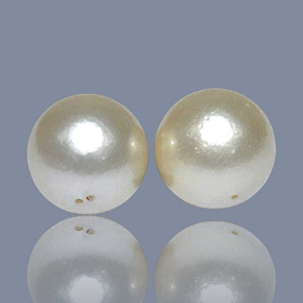 A Pair 42 Carat Round 14.2mm Natural Pale Gold South Sea Pearl Loose