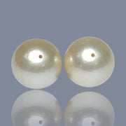 A Pair 42 Carat Round 14.2mm Natural Pale Gold South Sea Pearl Loose