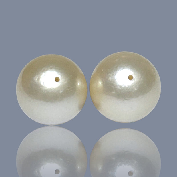 A Pair 42 Carat Round 14.2mm Natural Pale Gold South Sea Pearl Loose