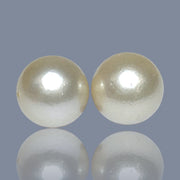 A Pair 42 Carat Round 14.2mm Natural Pale Gold South Sea Pearl Loose