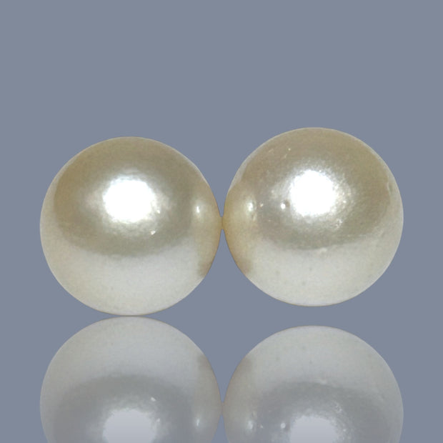 A Pair 42 Carat Round 14.2mm Natural Pale Gold South Sea Pearl Loose