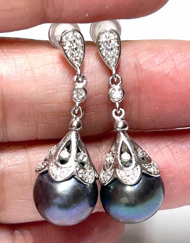 Round Edison 10 -10.5mm Purple Black Blue Pearl Dangle EarringsGorgeous 10 -10.5mm Edison Natural Purple Black Blue Cultured Round Pearl Handmade Dangle Earrings / Best For Gift
PEARL INFORMATION

Pearl Type: Genuine Edison CultEarringsFine JewelryThe Fine Pearls Jewelry5mm Purple Black Blue Pearl Dangle Earrings