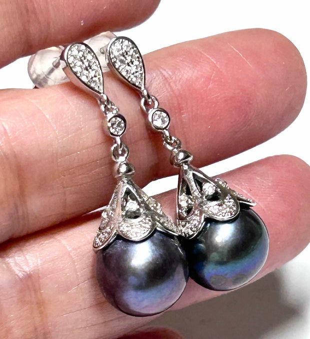 Round Edison 10 -10.5mm Purple Black Blue Pearl Dangle EarringsGorgeous 10 -10.5mm Edison Natural Purple Black Blue Cultured Round Pearl Handmade Dangle Earrings / Best For Gift
PEARL INFORMATION

Pearl Type: Genuine Edison CultEarringsFine JewelryThe Fine Pearls Jewelry5mm Purple Black Blue Pearl Dangle Earrings