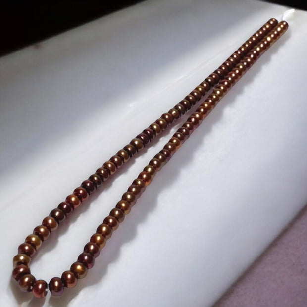 Shinny 6 - 6.5mm Corn Round Multi Brown Bronze Pearl 16" Strand