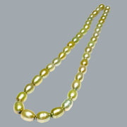 Smooth Oval 7 x 8.5mm Champagne Green Cultured FW Pearl 16" Strand