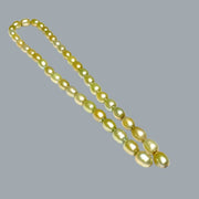 Smooth Oval 7 x 8.5mm Champagne Green Cultured FW Pearl 16" Strand