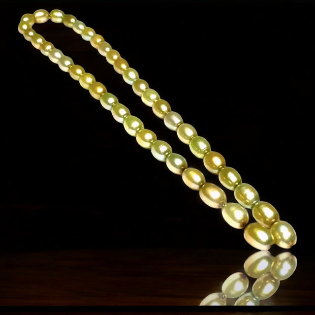 Smooth Oval 7 x 8.5mm Champagne Green Cultured FW Pearl 16" Strand