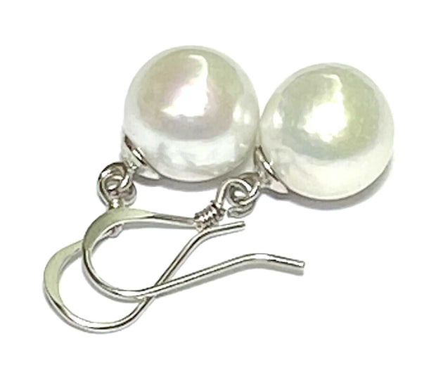 Classic Natural White 10mm Round Edison Cultured Pearl Dangle EarringsBirthday Great Gift For Her! Fabulous Classic Natural White Round 9.5 -10mm Edison Cultured Pearl Dangle Hook Earrings PEARL INFORMATIONPearl Type: Genuine Edison CuEarringsFine JewelryThe Fine Pearls JewelryClassic Natural White 10mm Round Edison Cultured Pearl Dangle Earrings – Timeless Elegance